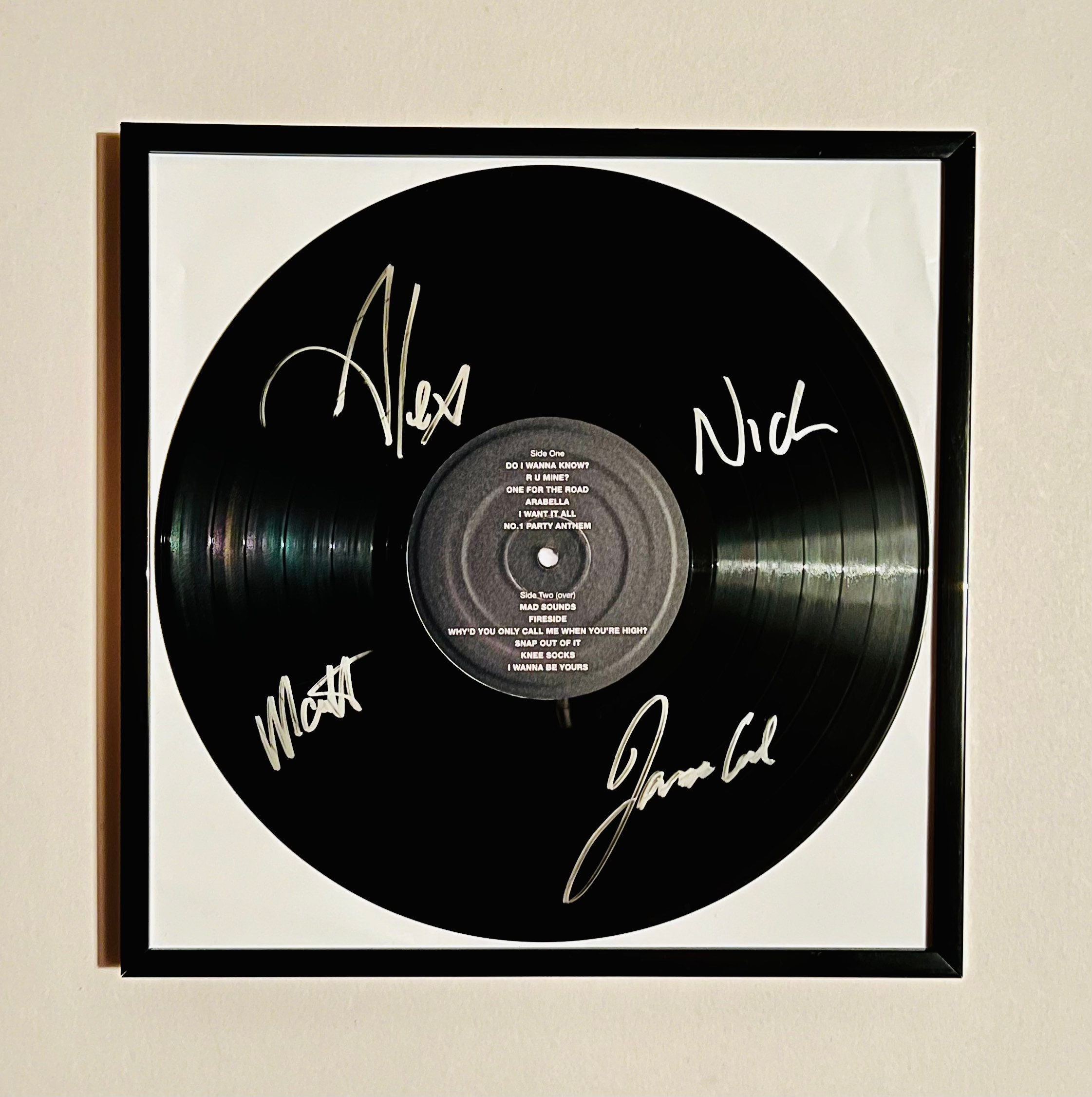 Arctic Monkeys AM disco de vinilo autografiado enmarcado -  México