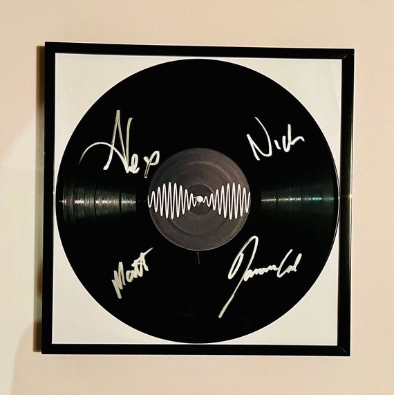 Arctic Monkeys AM disco de vinilo autografiado enmarcado