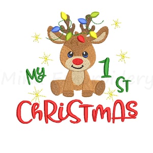 May include: Embroidered design featuring a cute cartoon reindeer with a red nose and Christmas lights on its antlers. The text "My 1st Christmas" is written below the reindeer.