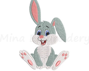 Puede incluir: Un lindo conejito de dibujos animados gris con orejas rosas y patas blancas está sentado con las piernas cruzadas. El conejito tiene ojos azules y una gran sonrisa.