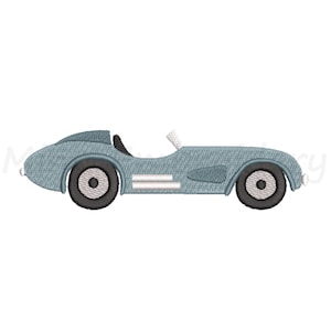 May include: A light blue vintage racing car with black wheels and white accents. The car is facing to the right.