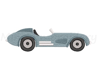 Pode incluir: Um carro de corrida vintage azul claro com rodas pretas e detalhes brancos. O carro está virado para a direita.