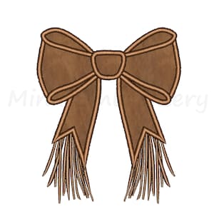 May include: A brown suede bow with fringed ends. The bow is tied in a classic shape with a centre loop.