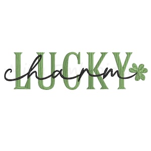 May include: Green embroidered text that reads "Lucky charm" with a green four-leaf clover.