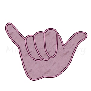May include: Pink embroidered hand making the shaka sign, a popular Hawaiian gesture of peace, aloha, and good vibes.