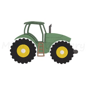 May include: An embroidery design of a green tractor with a black exhaust pipe, a brown ladder, and two large black tires featuring bright yellow centers. The tractor has a simple outline and a solid green body with a clear cabin frame structure.