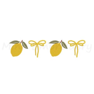 May include: Embroidered design featuring yellow lemons with green leaves and yellow bows. The design is repeated four times across the image. The lemons are oval-shaped and have a textured appearance.