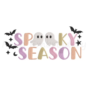 May include: An embroidery design featuring the text "SPOOKY SEASON" in pastel pink, lavender, and yellow letters. Two white ghost figures with black eyes replace the letter O. The design includes black bats, stars, and a crescent moon.
