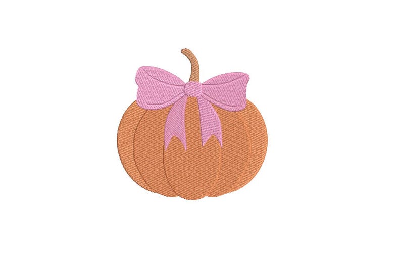 May include: An embroidered pumpkin with a pink bow. The pumpkin is orange with a brown stem. The bow is a light pink colour. The design is on a white background.