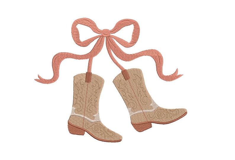 May include: An embroidered design featuring two cowboy boots with intricate detailing, suspended from a peach-colored bow. The boots are tan with white accents and a decorative pattern. A charming country-western theme.