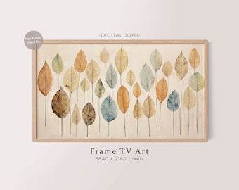 May include: A framed digital art print featuring a watercolor painting of stylized leaves in shades of brown, gold, green, and blue. The artwork is set against a cream-colored background and is labeled "Frame TV Art".