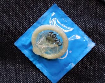 Condom Badge