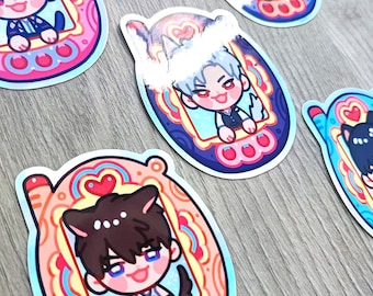 May include: A collection of colorful stickers featuring anime-style characters in a retro handheld game design. Each sticker showcases a different character with cat ears, set against a vibrant background of pink, blue, and orange. The text "ART BY @HSAPHIRYA - SAPHRIYA.STORENVY.COM" is visible.