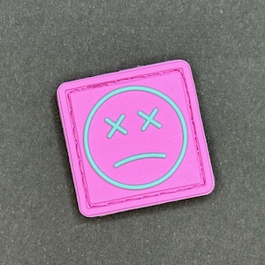 Parche de moral de PVC con cara triste, ojo de Ranger rosa cian (2,5 x 2,5 cm)