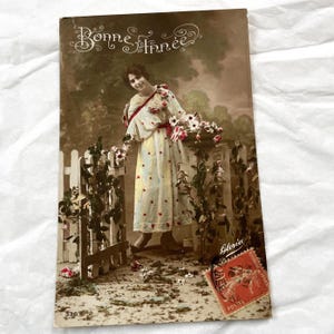 Lata 1910. - Francuska zabytkowa pocztówka Kobieta - Napisana zabytkowa pocztówka - Karta noworoczna