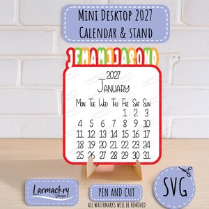 May include: A 2027 mini desktop calendar and stand featuring a white square card with black text for January, a red border, and a colorful monthly tab header. Includes small labels reading Mini Desktop 2027 Calendar & Stand, Pen and Cut, and SVG.