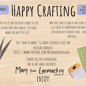 May include: A wooden background with the words "HAPPY CRAFTING" in large black letters. The image includes text about the Etsy shop, a pair of scissors, a cutting mat, and a scraper tool. The shop's name, "Larmackry Designs," is also featured.