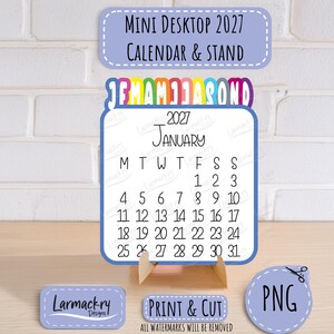 May include: A 2027 mini desktop calendar and stand featuring a white page with black text for January, a colorful monthly tab header, and light purple labels with the text Mini Desktop 2027 Calendar & Stand, Print & Cut, and PNG.