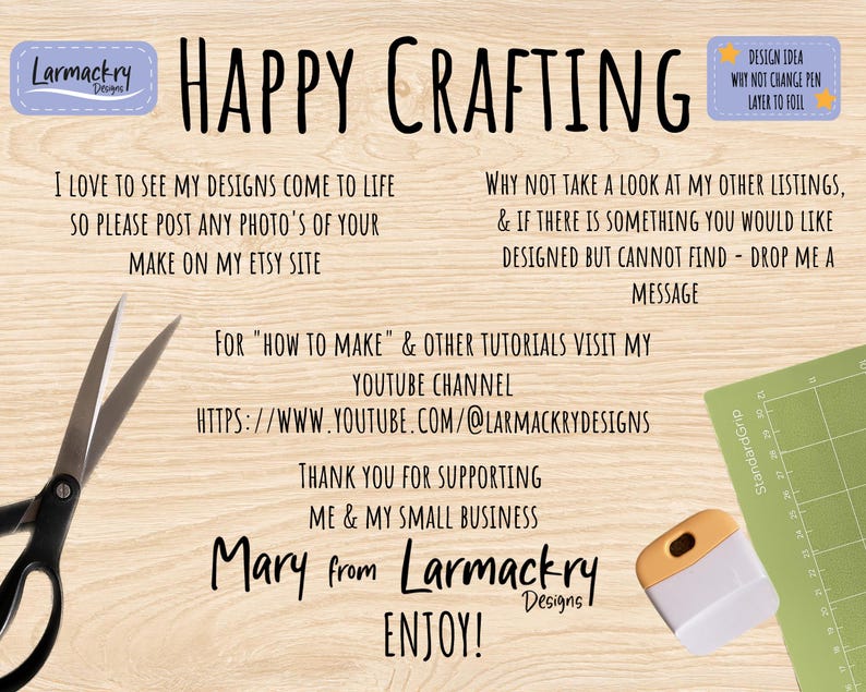 May include: A light wood grain background featuring black text that reads Happy Crafting, Larmackry Designs, and instructions for social media and tutorials. Black scissors are on the left, and a green cutting mat with a scraper tool are on the right.