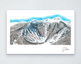 May include: A detailed illustration of a mountain range with snow-covered peaks and ski trails winding through brown, forested slopes. A bright blue sky is visible above the peaks. The word Stowe is written in black cursive in the bottom right.