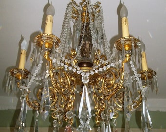 antique Louis XVI chandelier in crystal and bronze with nineteenth century venus