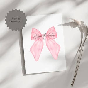 May include: A white greeting card featuring a watercolor-style pink bow with the words "Happy Birthday" in black script. The card also has a gray circular badge that says "Instant Download".