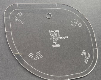 Rounded corner guide for sewing and crafting.