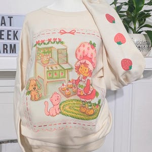 Maglione con cartoni animati anni '80 a forma di fragola, maglione nostalgico anni '80, felpa color crema dolce con effetto retrò anni '80