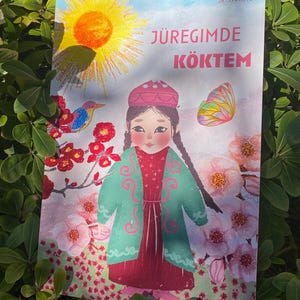 Un cartel con una niña kazaja con ropa nacional impreso en papel para decoración de paredes en tamaño A6, tamaños A4 y A3.