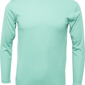 May include: A light green long-sleeved t-shirt.