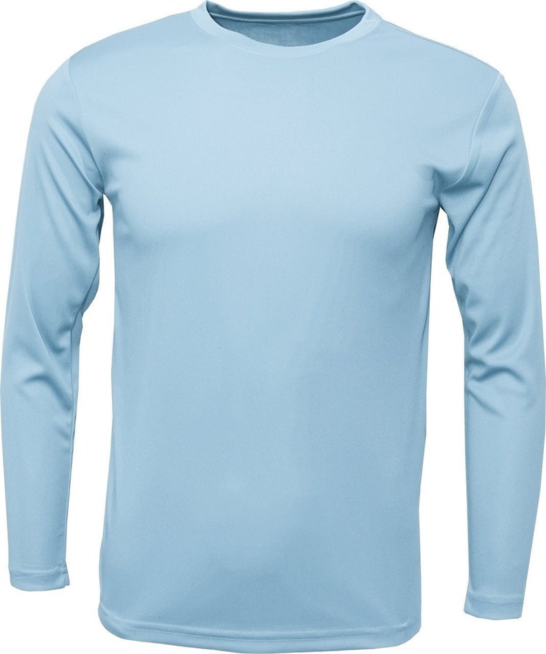 May include: A light blue long-sleeved t-shirt.