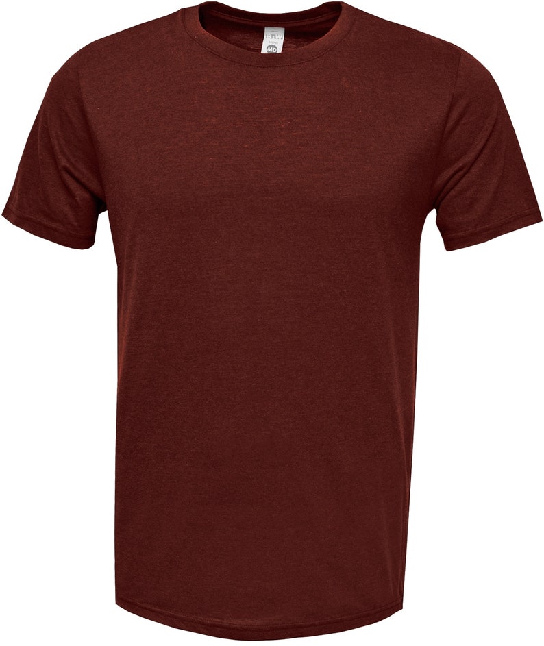 Pode incluir: Uma camiseta de manga curta de cor marrom, feita de um tecido macio e confort&aacute;vel.