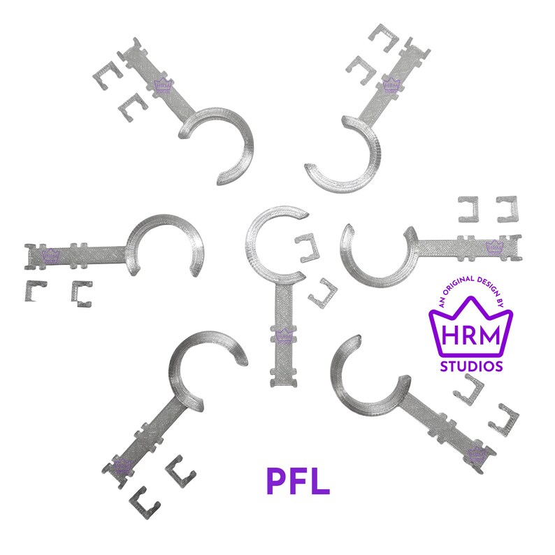 May include: A collection of silver-colored, key-shaped tools with a curved end and a rectangular handle. Small, square-shaped pieces are scattered around the keys. The text "PFL" is displayed in purple. The image also includes the HRM Studios logo.