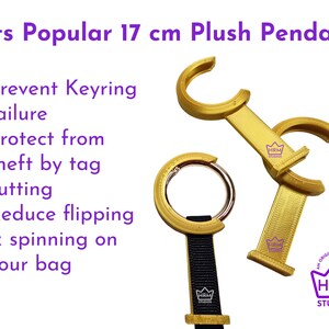 May include: Gold-colored keychain accessories with a black strap and silver ring. Text on the image reads "Fits Popular 17 cm Plush Pendant." Additional text highlights features like preventing keyring failure and reducing flipping on bags.