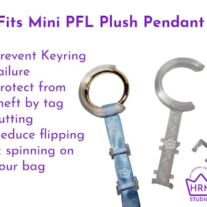 May include: A silver-colored keychain attachment with a gold ring, attached to a light blue ribbon. The text reads "Fits Mini PFL Plush Pendant". Additional text includes "Prevent Keyring failure", "Protect from theft by tag cutting", and "Reduce flipping & spinning on your bag".