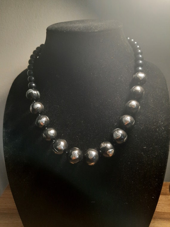 Vintage plastic black necklace with silver tone he
