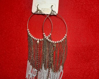 Fringe hoop earrings by the brand Neu, from the 2007 collection, are crafted from lead-free materials