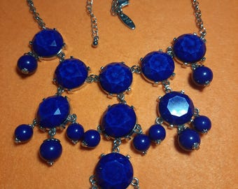 New York & Company statement necklace features faceted blue acrylic beads on a silver-tone chain