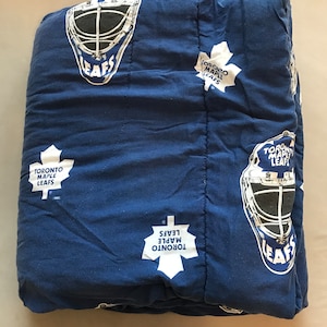 90er Jahre Toronto Maple Leafs Tröster - Hockeyhelm und Leafs Logo-Muster
