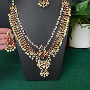 Ruby Pink Peacock Haram with Earrings: Matte Antique Gold Indian Jewelry