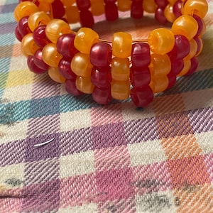 Kandi cuff (orange and red)