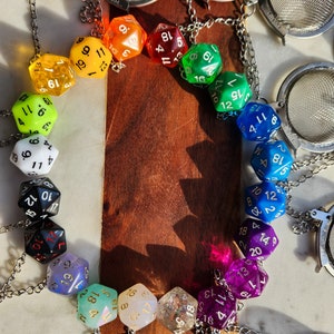 The iridescent dice in the bottom left corner are no longer available, sorry!
