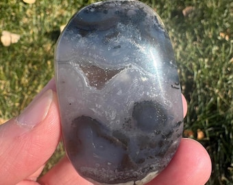 Volcanic agate crystal palm stone 2 1/4” (with natural inclusions)