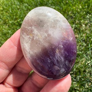 Amethyst Crystal palm stone 2” (with natural inclusions)