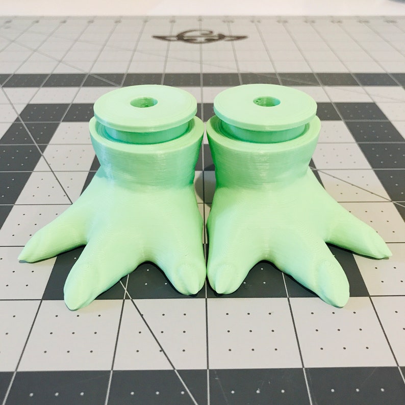 Feet with ankles and pegs, used in custom installations, shown in regular baby Yoda Green.  Specifically designed to fit leg pants by the Little Green Jelly Bean Bodies BY CSF shop here on Etsy: https://www.etsy.com/shop/LilGreenBeansbyCSF