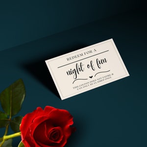 Night of Fun coupon card with red rose on table