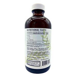 May include: A brown glass bottle of Black Cumin Seed Oil with a white label. The label includes nutritional facts, ingredients, directions, and warnings. The bottle is labeled as gluten-free and vegan.
