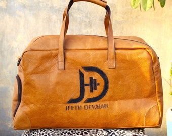 Genuine Leather Duffel Bag , XL size with custom logo comfortbale handles and adjustable strap , 12x24 inches