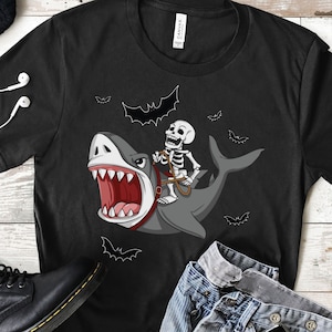 T shirt squelette femme sale