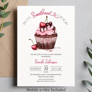May include: A pink and white baby shower invitation with a watercolor illustration of a cupcake topped with a cherry and chocolate drizzle. The text reads "Our Little Sweetheart is on the way" and includes details for the event, including the date, time, and location.